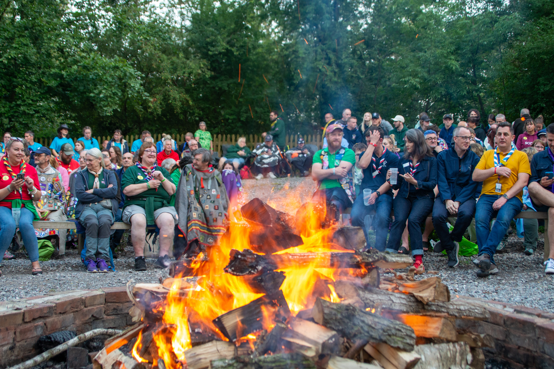 Leader's sat around a campfire at Gilwell Reunion